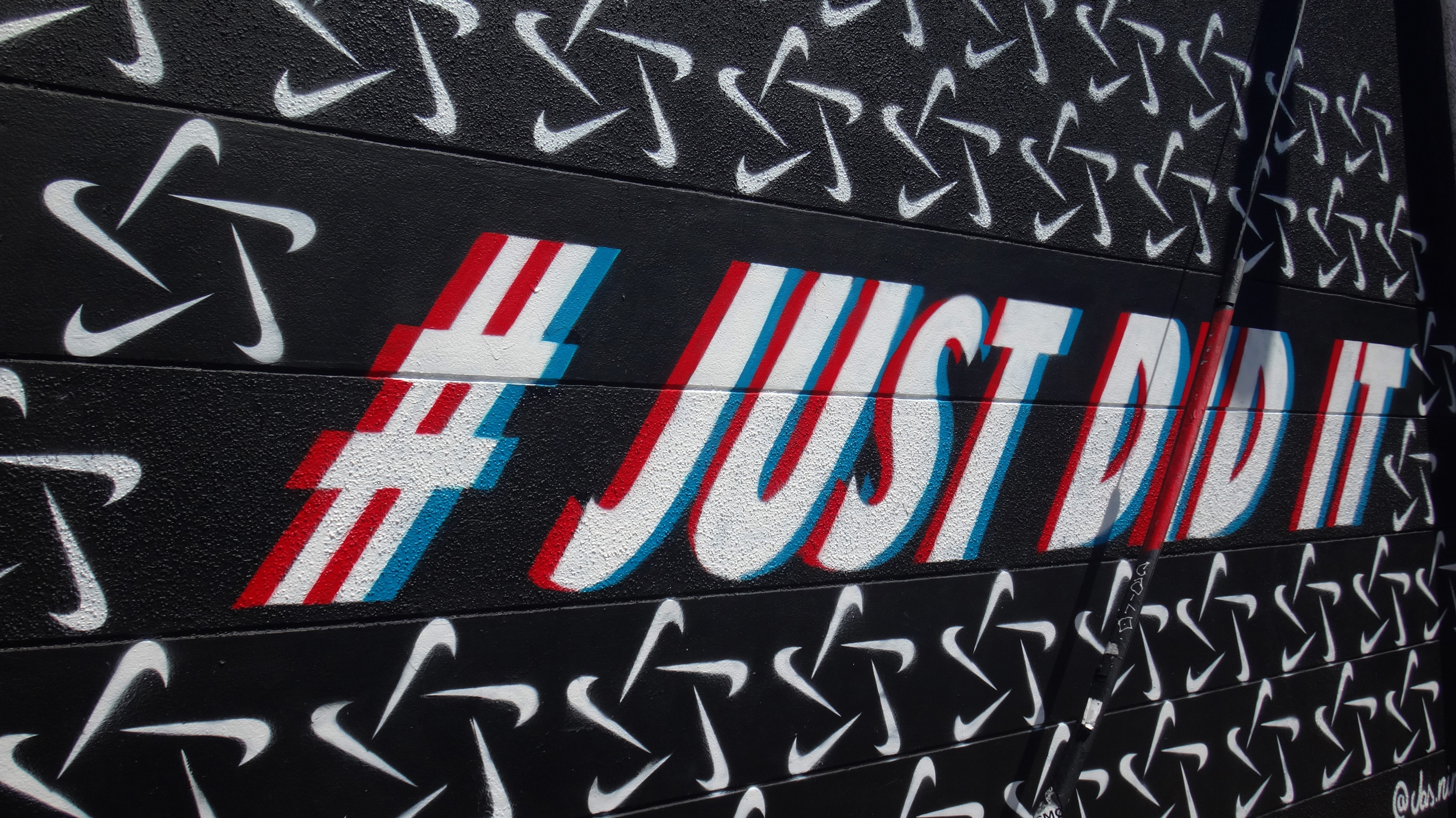 "Just do it" written on a wall