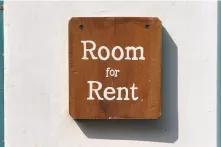 sign on wall "room for rent"