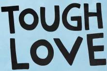 poster with "tough love" written on it