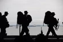 soldiers with backpacks