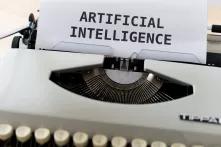 typewriter writes "artificial intelligence"