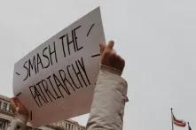 poster at a demonstration saying "smash patriarchy"
