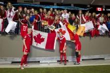 Young soccer fans stand behind Canada's Women's National Soccer Team