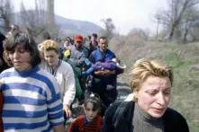 Kosovar refugees fleeing their homeland. 