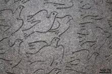 peace doves flying, stone engraving