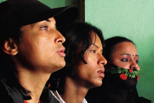 Cover photo of the Global Gaze Report two men and a woman looking to the right