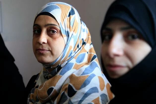 Syrian woman after her escape in a hospital in Jordan.