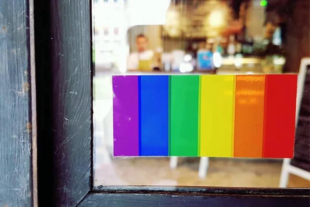 Rainbow sign on a coffeeshop