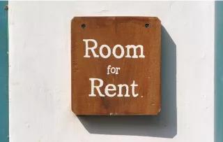 Room for Rent sign on wall "room for rent"