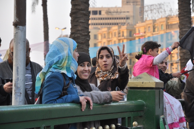 Citizens celebrating in Tahrir Square the day after Mubarak resigned Women celebrating