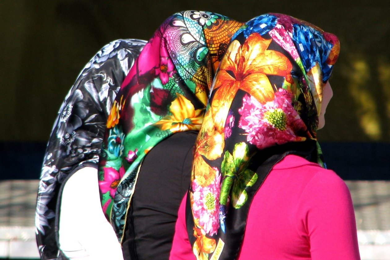 Women with headscarves Women with headscarves seen from the back