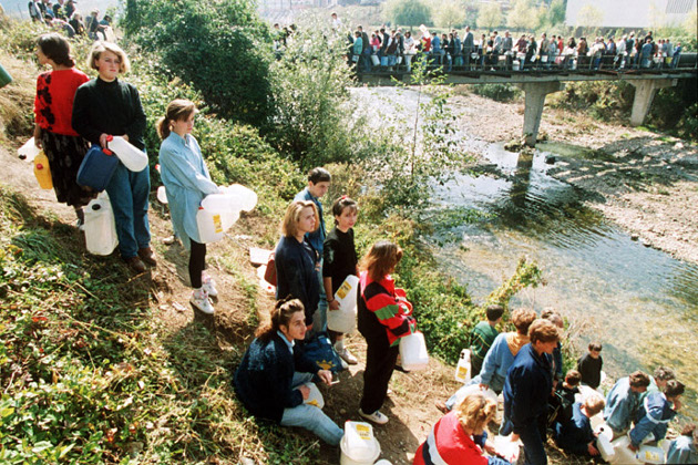 People waiting in line to gather water during the Siege of Sarajevo, 1992 People waiting in line to gather water during the Siege of Sarajevo, 1992